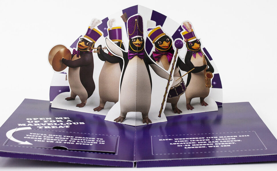 Cadburys pop-up invitation featuring a brass band of penguins