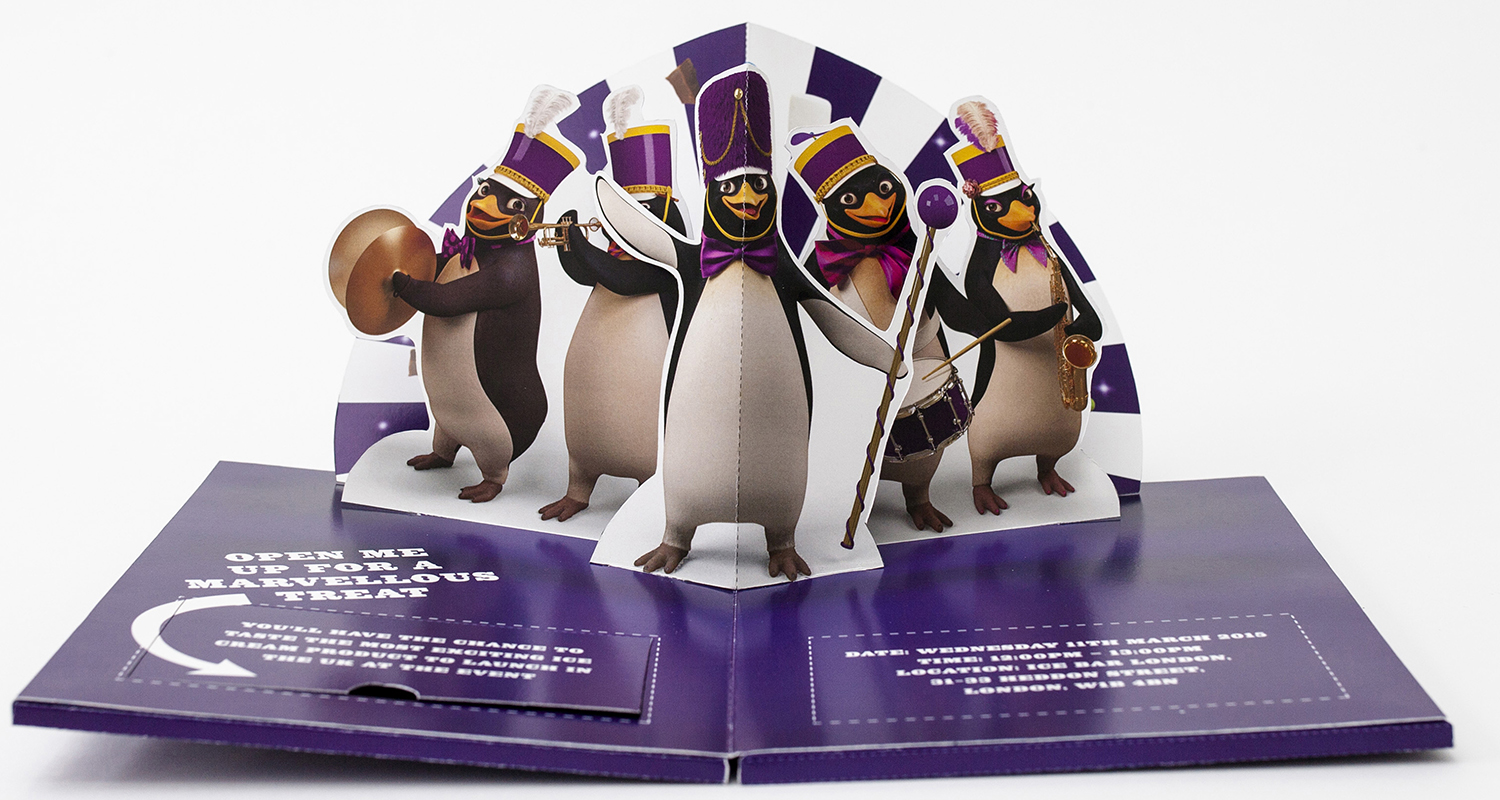 Cadburys pop-up invitation featuring a brass band of penguins